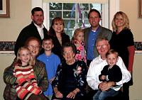  The Angstadt photo. On the right side, seated with white shirt: Charles Angstadt, III holding Charles Angstadt the fifth.  Standing with blue shirt: Charles Angstadt IV.