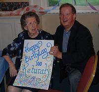  Aunt Keturah and Larry Dunster. Keturah is presented the card which Debra Cook prepared. It had signatures of most folks in attendance.